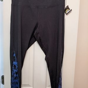 Black exercise leggings with blue detailing